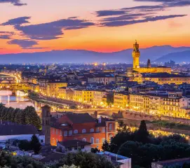Couples enjoying a romantic sunset viewpoint in Florence on a honeymoon trip from Chennai